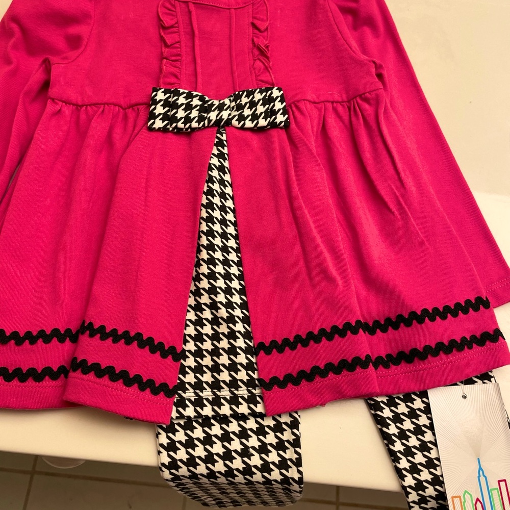 NWT. Kid headquarters. Pink with black and white checkered pattern.